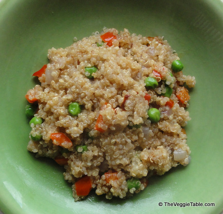 Quinoa pilaf with peas and red peppers